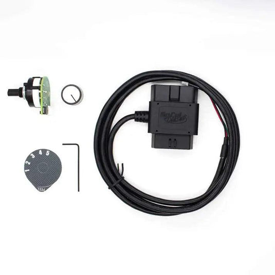 Show the GDP CSP-5 Switch installed in a 2006-2021 Dodge Ram Cummins or a 2017-2023 GM/Chevy Duramax L5P. Focus on the switch's placement within easy reach for driver convenience, highlighting its sleek, unobtrusive design that blends with the vehicle's interior.