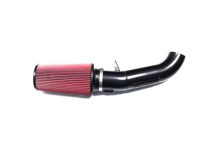 Load image into Gallery viewer, A sleek 4&quot; Open Air Intake Tube paired with a top-grade S&amp;B Filter, both items highlighting their design and build quality, displayed against a neutral backdrop, emphasizing their compatibility with the 2011-16 Ford Powerstroke 6.7L.
