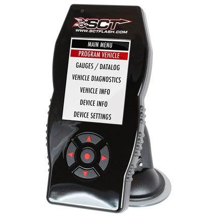 Visualize the SCT X4 Tuning Device with its LCD screen lit up, showing performance metrics, against a modern, technological backdrop. Include symbols representing its compatibility with Ford vehicles from 1996 to 2019, emphasizing its key features: custom tune storage, ease of use, and wireless updates. The setting should imply a high-tech automotive environment.